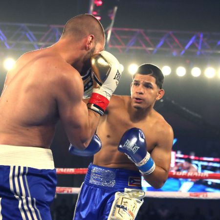 Edgar Berlanga fighting an opponent in a competitive match.